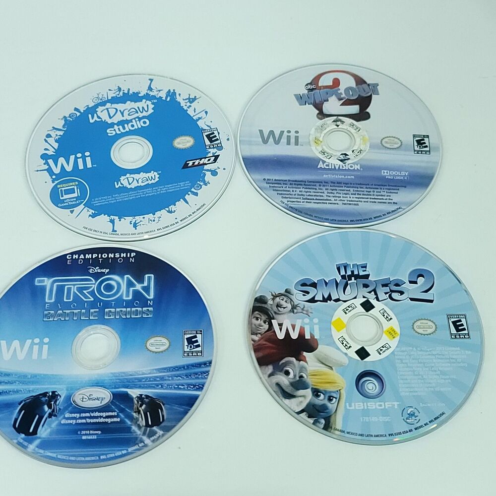 Nintendo Wii Games Lot of 4 Bundle Tron Smurfs 2 U Draw Wipeout 2